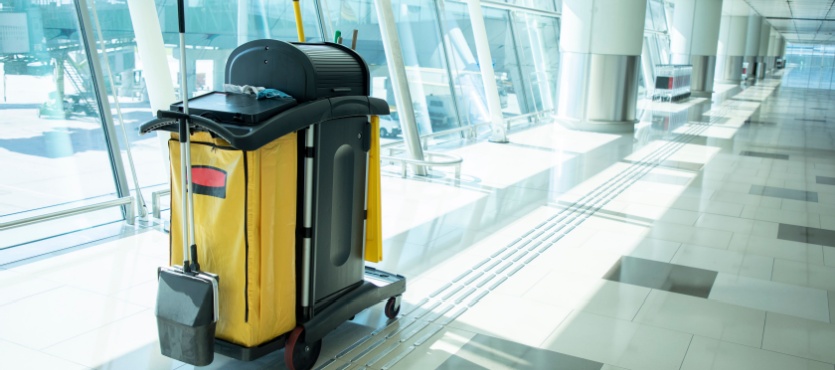 Janitorial cart in a hallway ready for restroom janitorial services in Delray Beach