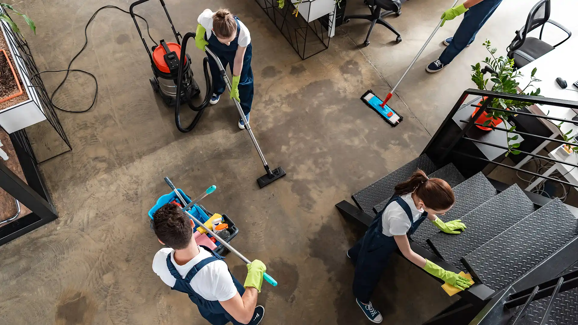 Team providing janitorial services in an open office in Pompano Beach