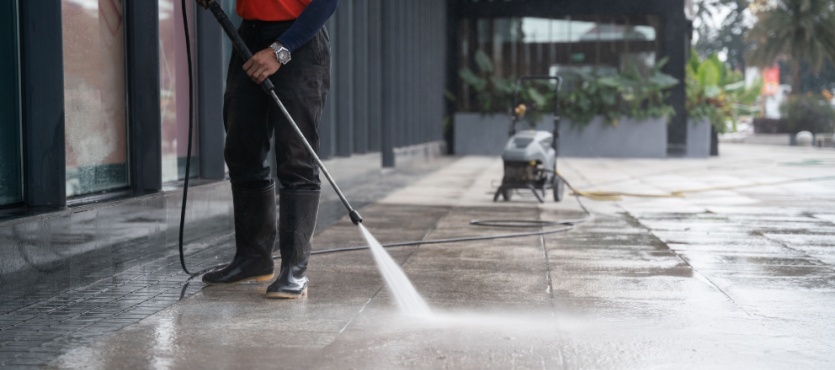 Pressure washing a walkway during commercial pressure cleaning in Pompano Beach