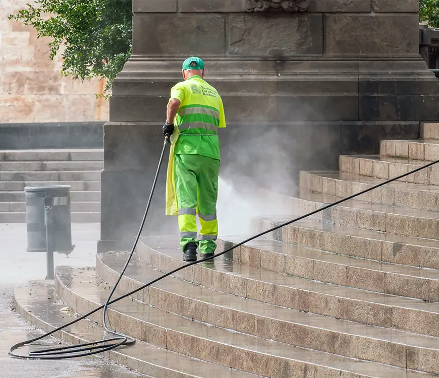 Business steps being pressure washed during commercial pressure cleaning in Plantation