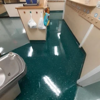 Freshly cleaned school restroom floor after commercial floor cleaning in Davie
