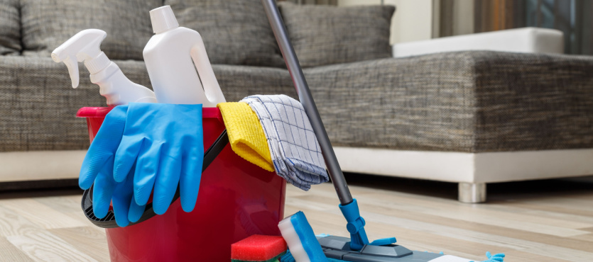 Bucket of supplies for spring commercial cleaning in Delray Beach