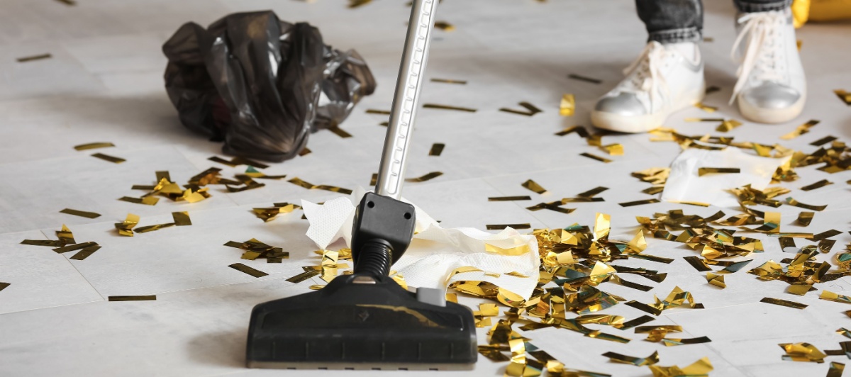 Vacuuming confetti after an office party during commercial cleaning in Delray Beach