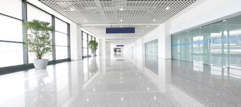 Glossy corridor floor after commercial floor waxing in Coral Springs