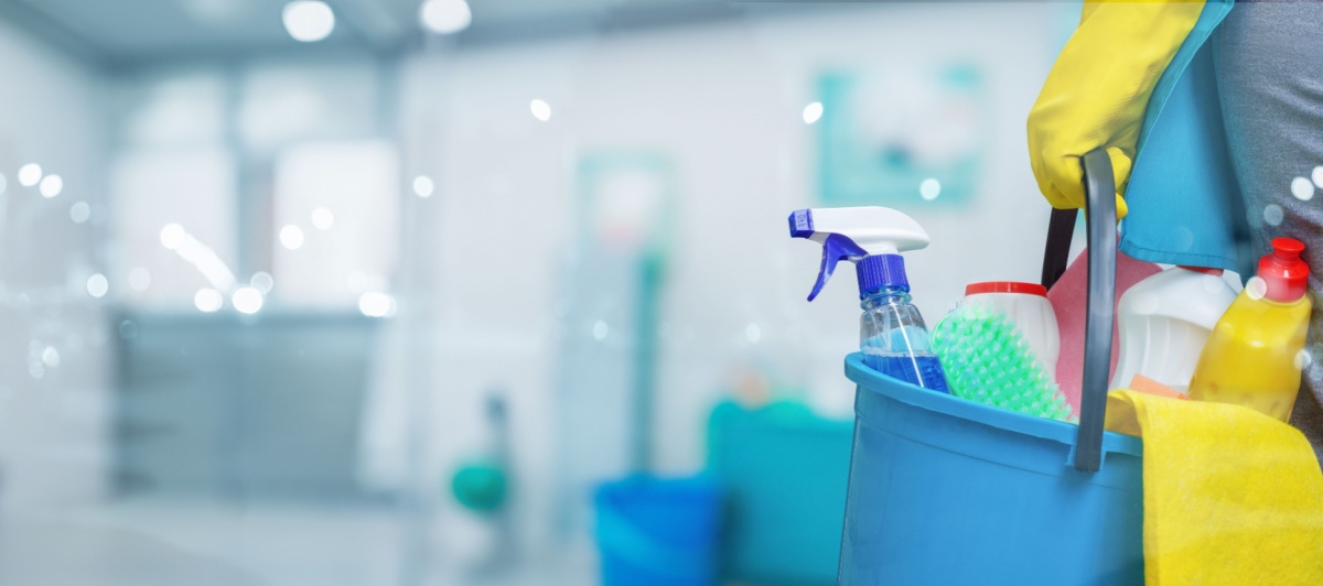 Bucket of cleaning supplies for scheduled janitorial services in Coral Springs
