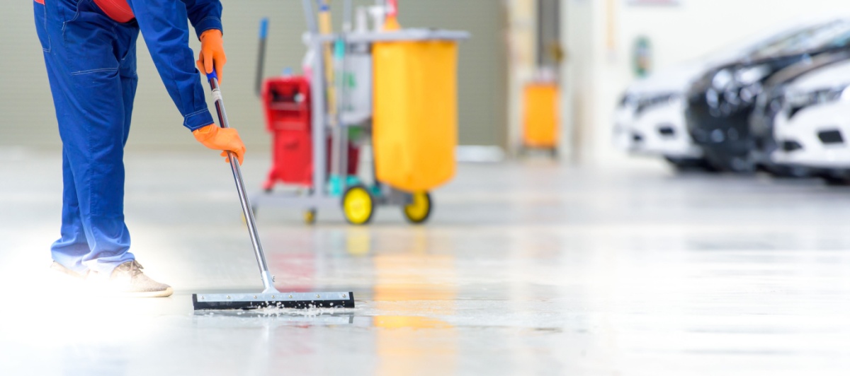 Worker mopping a new floor during post construction cleaning in Fort Lauderdale