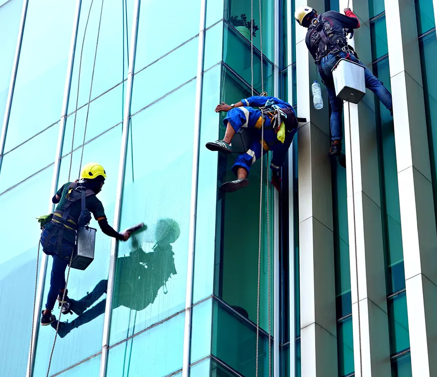 Commercial window cleaning in progress in Plantation, FL